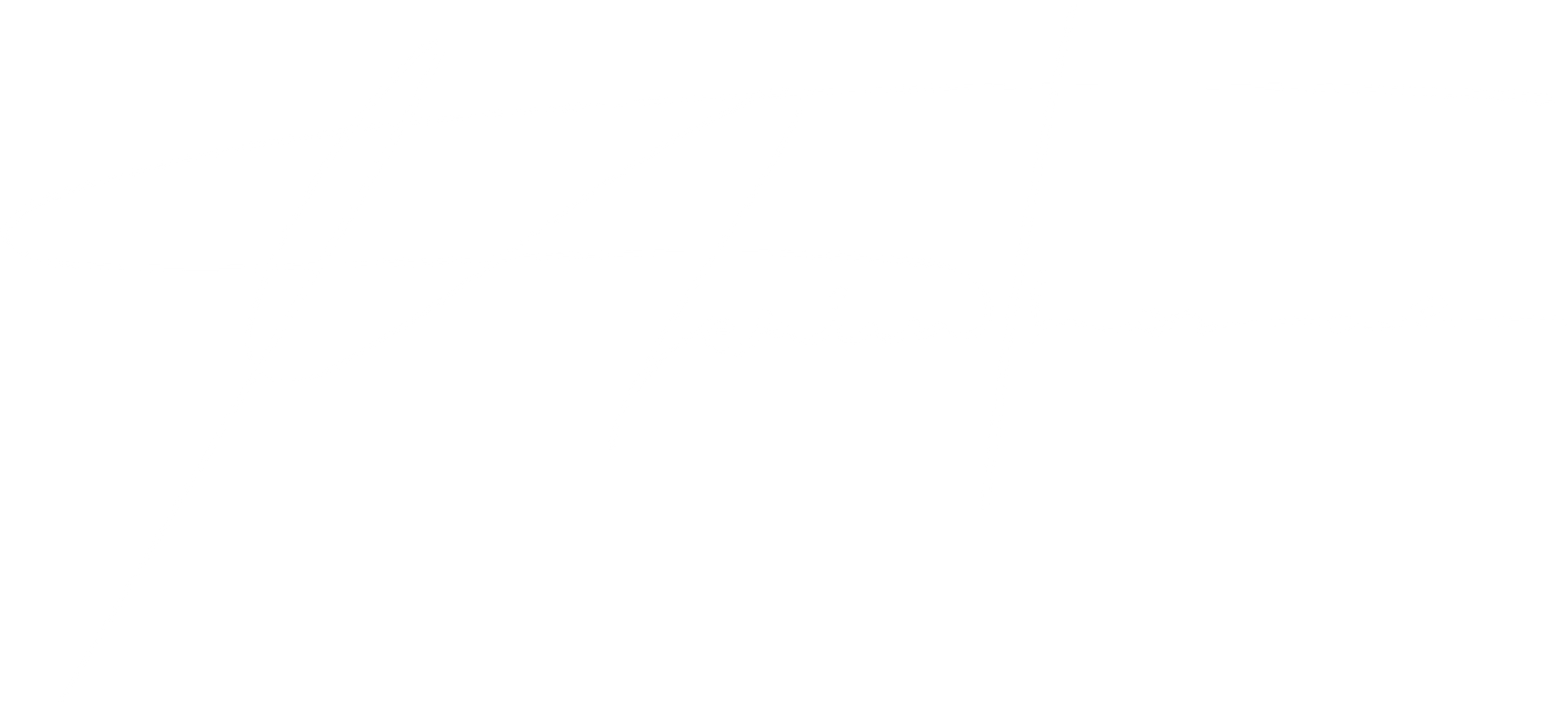 Un chien est allongé dans l'herbe 